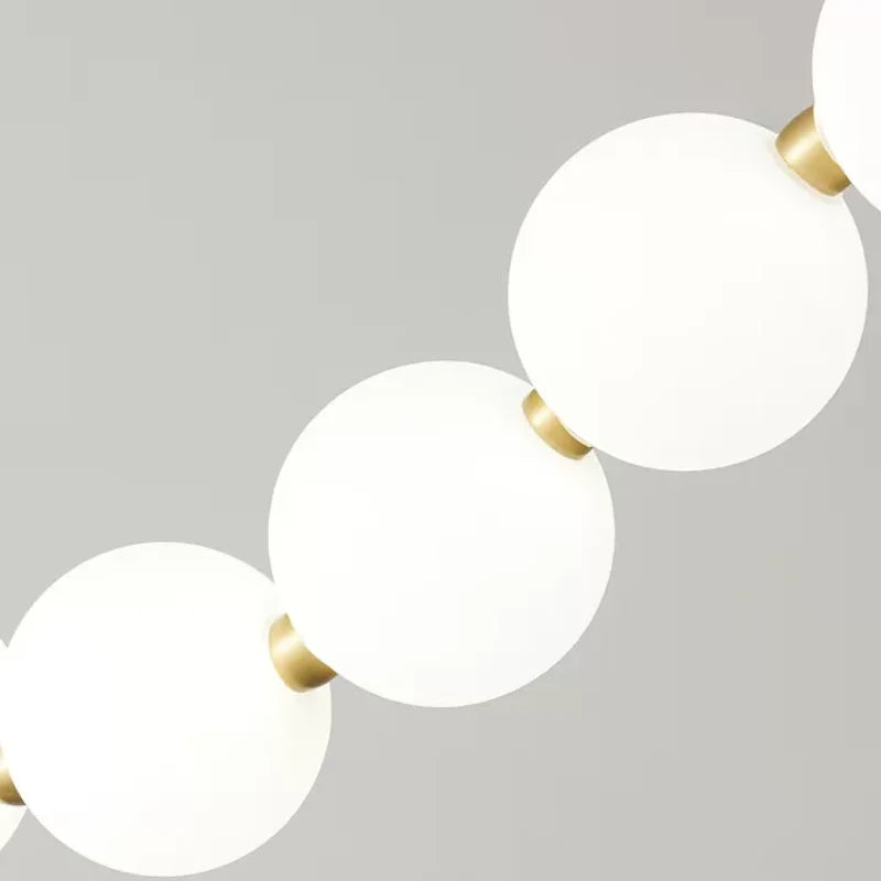 suspension lumineuse moderne blanc doré boules rondes salon chambre restaurant étude