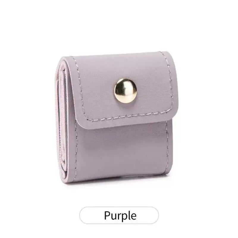 porte bijoux simili cuir violet moderne boutons pression collier bracelet boucles oreilles violet blanc