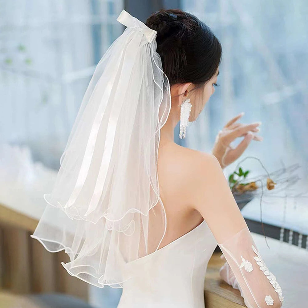 voile mariée tulle plissé blanc classique romantique fixé noeud transparent élégant