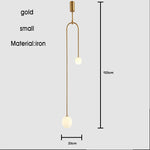 suspension lumineuse moderne sphères translucides structure métallique vis doré noir blanc