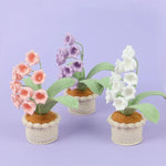 fleurs artificielles tricotées rose violet blanc jaune artisanal ornement décoration maison