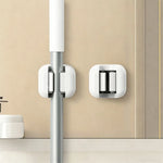 supports balai ventouse crochets muraux blancs modernes rangement murs lisses minimalistes
