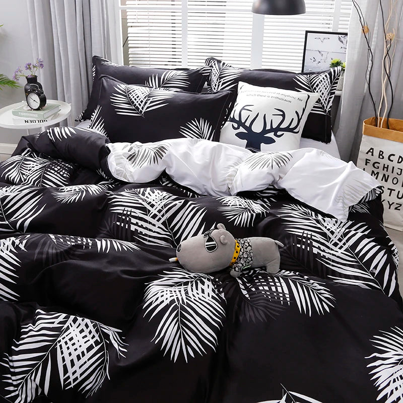 Housse de couette réversible montrant les deux côtés noir et blanc