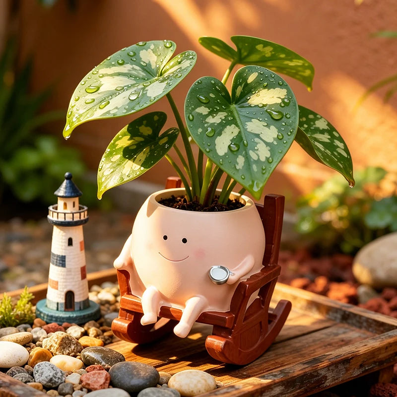 pots fleurs résine forme fantôme souriant rocking chair plantes vertes philodendron buis sedum décoratives