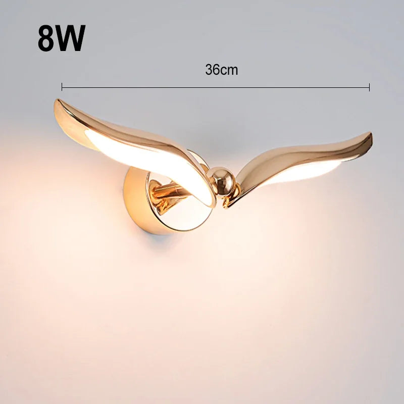 lampe murale moderne dorée ailes oiseau stylisées éclairage intérieur chambre salon corridor bar opacité