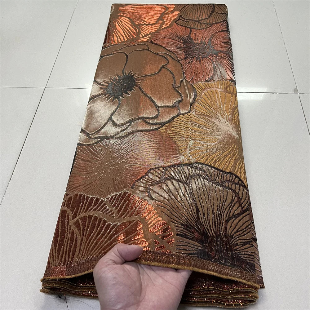 tissu gaze brodée résistance abrasion occasion gala moderne élégant fleurs stylisées orange marron violet