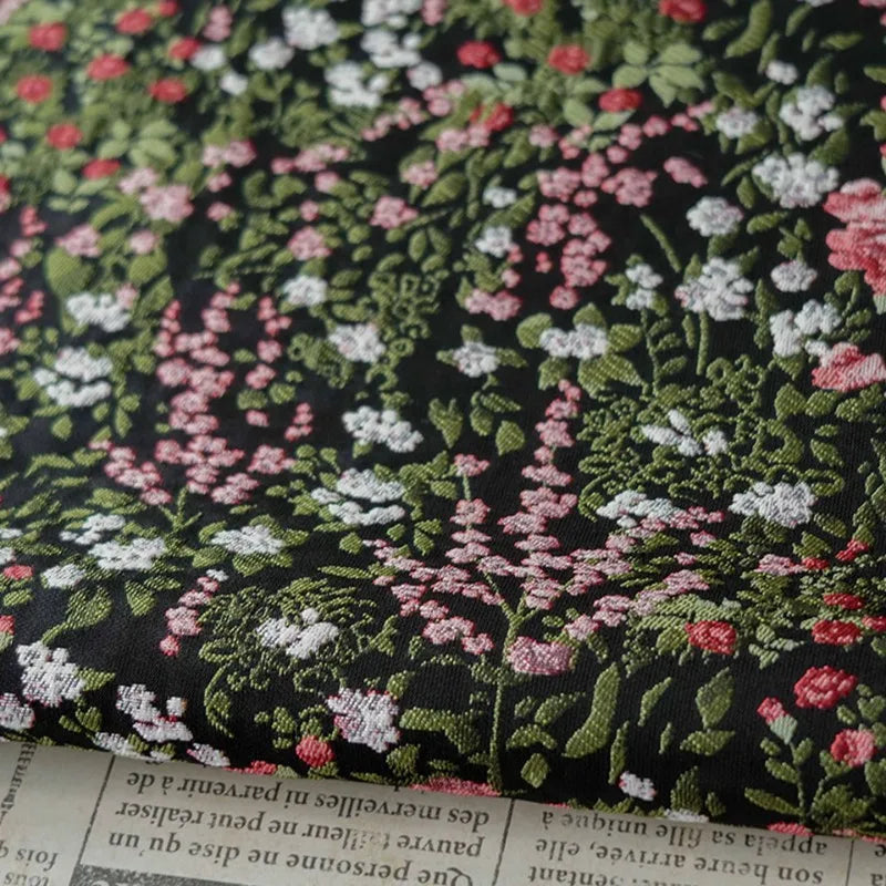 tissu imprimé fleurs noires roses blanches divers motifs coton polyester féminin romantique