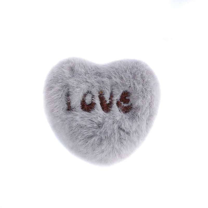 porte plaid peluche rose clair gris yeux fermés doux anti dérapant fixateur couette