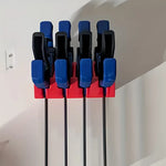 organisateur mural outils pinces linge gris rouge jaune bleu fixations 3D texturé utilitaire industriel