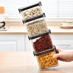 boîtes rangement alimentaires transparentes poignées noires grains pâtes fruits secs moderne pratiques résistantes humides