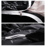 ensemble literie moderne motif marbré abstrait noir blanc pièces duvet taies d'oreiller