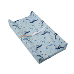 tapis changement bébé beige bleu clair imprimé dinosaures poissons ceinture sécurité moderne pratique