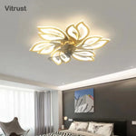 plafonnier moderne or noir feuilles stylisées led télécommande flux lumineux 2000 82000 tension 110