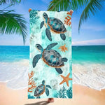 serviette plage microfibre motif marin tortues dauphins poissons illustration animale bleu clair vert orange