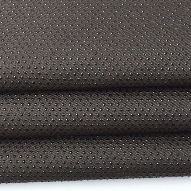 tissu antidérapant polyester acrylique blanc noir bleu gris moderne perforations 150cm non slip