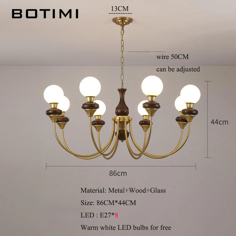 lustres modernes chandelier or marron foncé ampoules led globes opaques éléments décoratifs