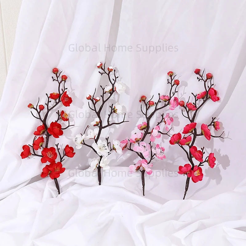 décoration intérieure branche fleurs artificielles rouge blanc rose naturel minimaliste