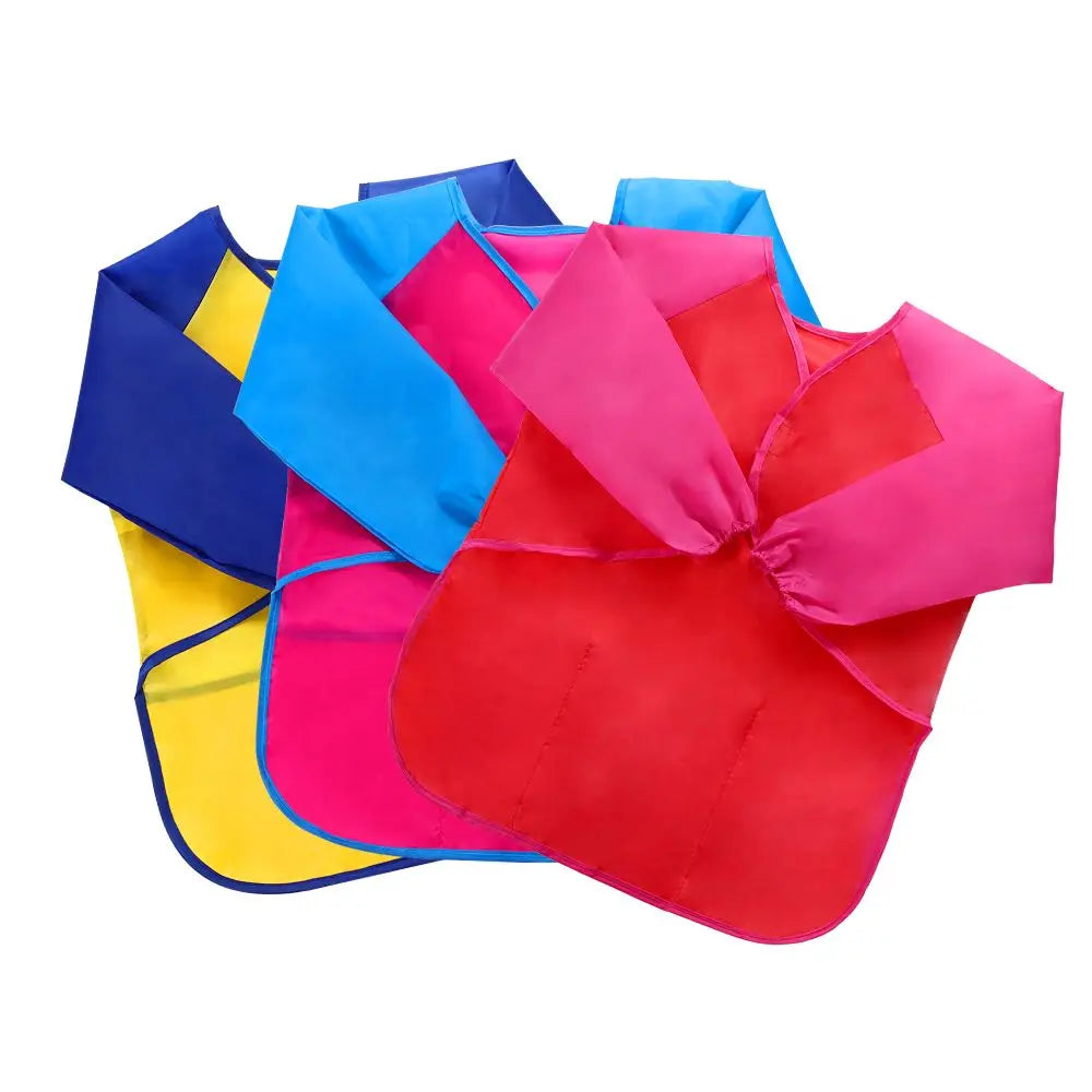 tablier peinture imperméable enfant pinceaux jaune bleu rose poche élastique pratique