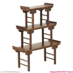 meuble pliant bois sculpté finition lisse traditionnel artisanal plateau pieds marron foncé