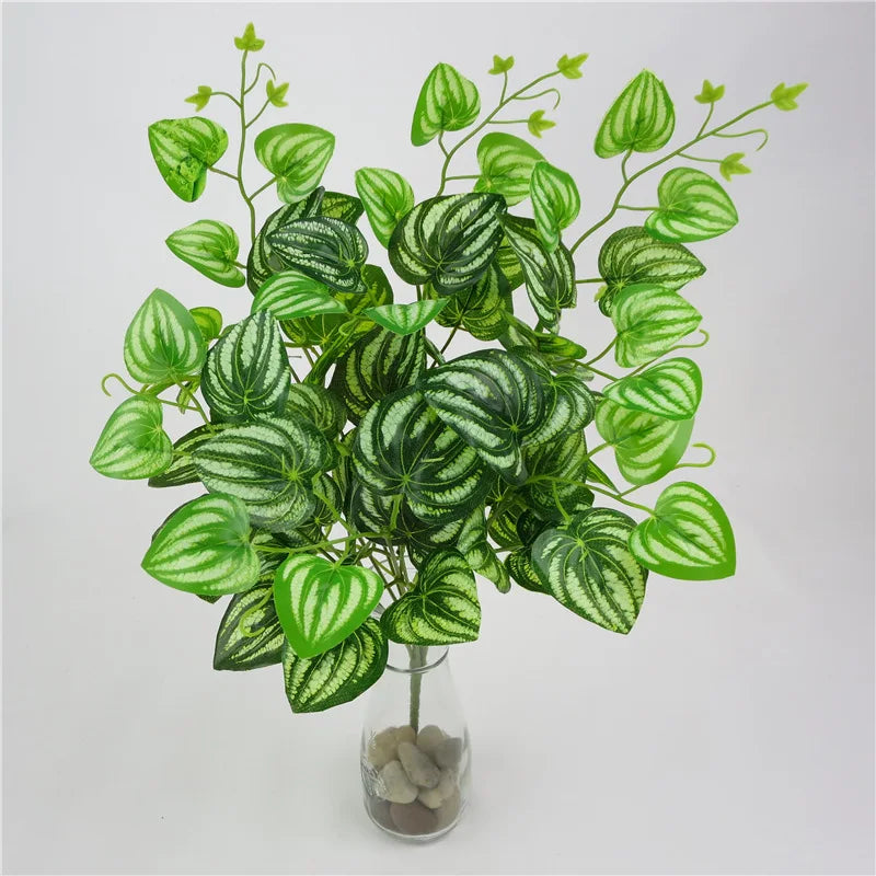 plantes artificielles violet vert marron feuilles ovales moderne décoration extérieure vase galets noirs blancs