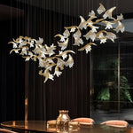 lampe suspendue contemporaine élégante dorée feuilles stylisées lumière blanche translucide 3000k 4000k 6000k
