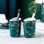 ensemble salle bain moderne marbre doré blanc distributeur savon porte brosse dents tasses plateaux