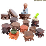 support plante bois sculpté artisanal marron foncé pot fleurs décoration végétale rustic stand