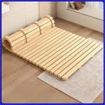 lit plateau bois minimaliste tapis géométrique matelas blanc coussins abstraits