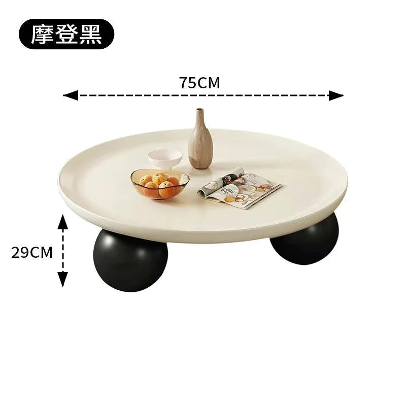 table basse ronde moderne pieds sphériques diamètre 75cm noir blanc cassé tulipes roses fleurs