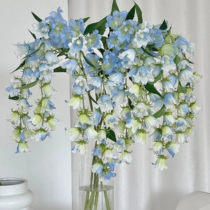 décoration intérieure moderne bouquet fleurs cloches vase transparent anniversaire événements