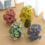 décoration intérieure plante artificielle feuilles variées moderne minimaliste verte rouge noire jaune blanche ornement