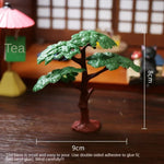 sculpture miniature artisanale arbres feuilles oiseaux balançoire pierres fleurs naturelextérieur jardin decoration résine
