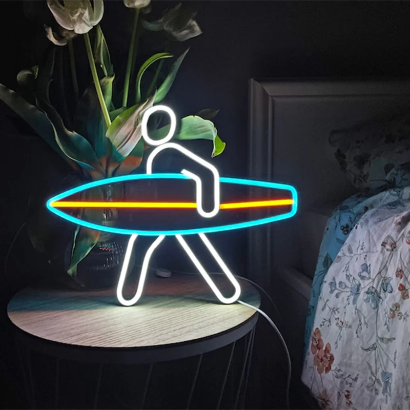 néon lumineux surfman silhouette planche surf couleur bleue jaune verte led moderne minimaliste