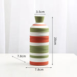 vase moderne céramique rayures vert blanc rouge table décoration fleurs artificielles maison étude