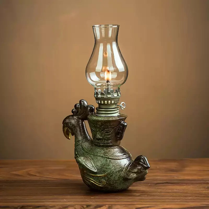 lampe huile vert verre transparent base grès doré oiseau stylisé vintage oriental décoration intérieure