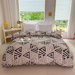 housse couette géométrique triangles beige noir blanche moderne minimaliste chambre lit