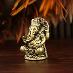 statues ganesha bronze doré détails sculptés traditionnelles indiennes ornement maison