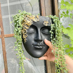 décoration murale résine sculpturale masque noir motif floral doré plante verte fixations