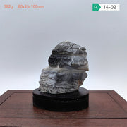 pierre naturelle sculpture rocheuse aspect irrégulier nuance grise minimaliste décoration chambre sérénité harmonie naturelle