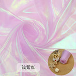 tissu iridescent multicolore rayures ondulées effet holographique semi transparent moderne élégant polyester respirant mètre