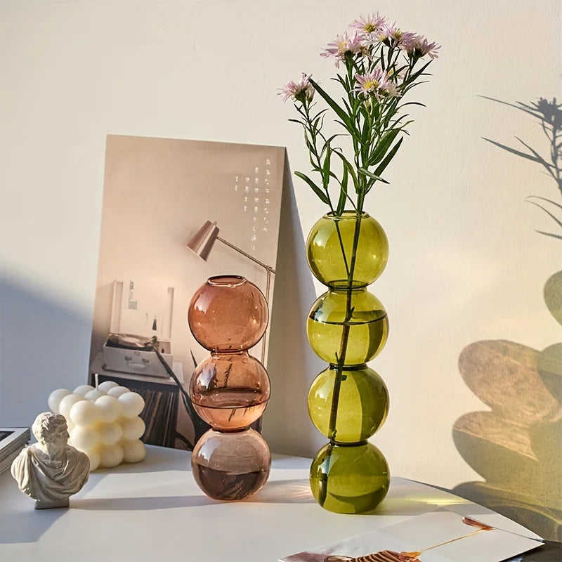 vases transparents modernes sphères empilées bleu vert marron beige