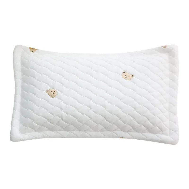 coussin bébé blanc quilté motifs animaux dorés moderne confortable