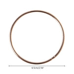 anneaux suspension dorés ronds concentriques métal opaques tailles variées moderneintérieurcoration minimaliste