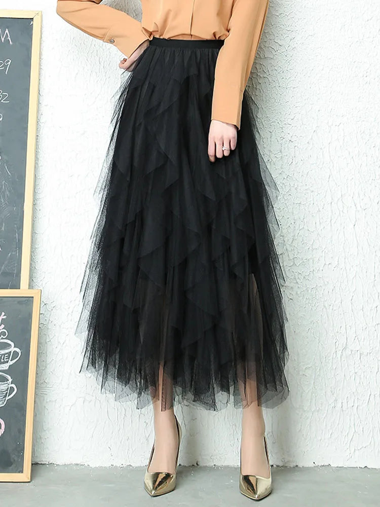 jupe féminine tulle élégante bleu clair noir rose pâle translucide plissée haute élasticité coton