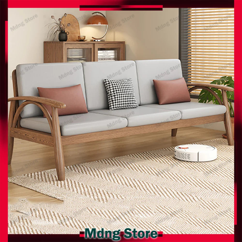 canapé places scandinave beige clair fauteuil pied poule moderne tapis géométrique terracotta blanc