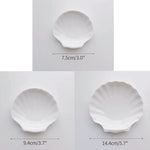 assiettes blanches modernes céramique lisses rangement présentation alimentaire set tailles différentes