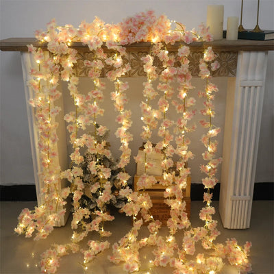Guirlande lumineuse fleur de cerisier LED pastel 180cm suspendue dans un intérieur