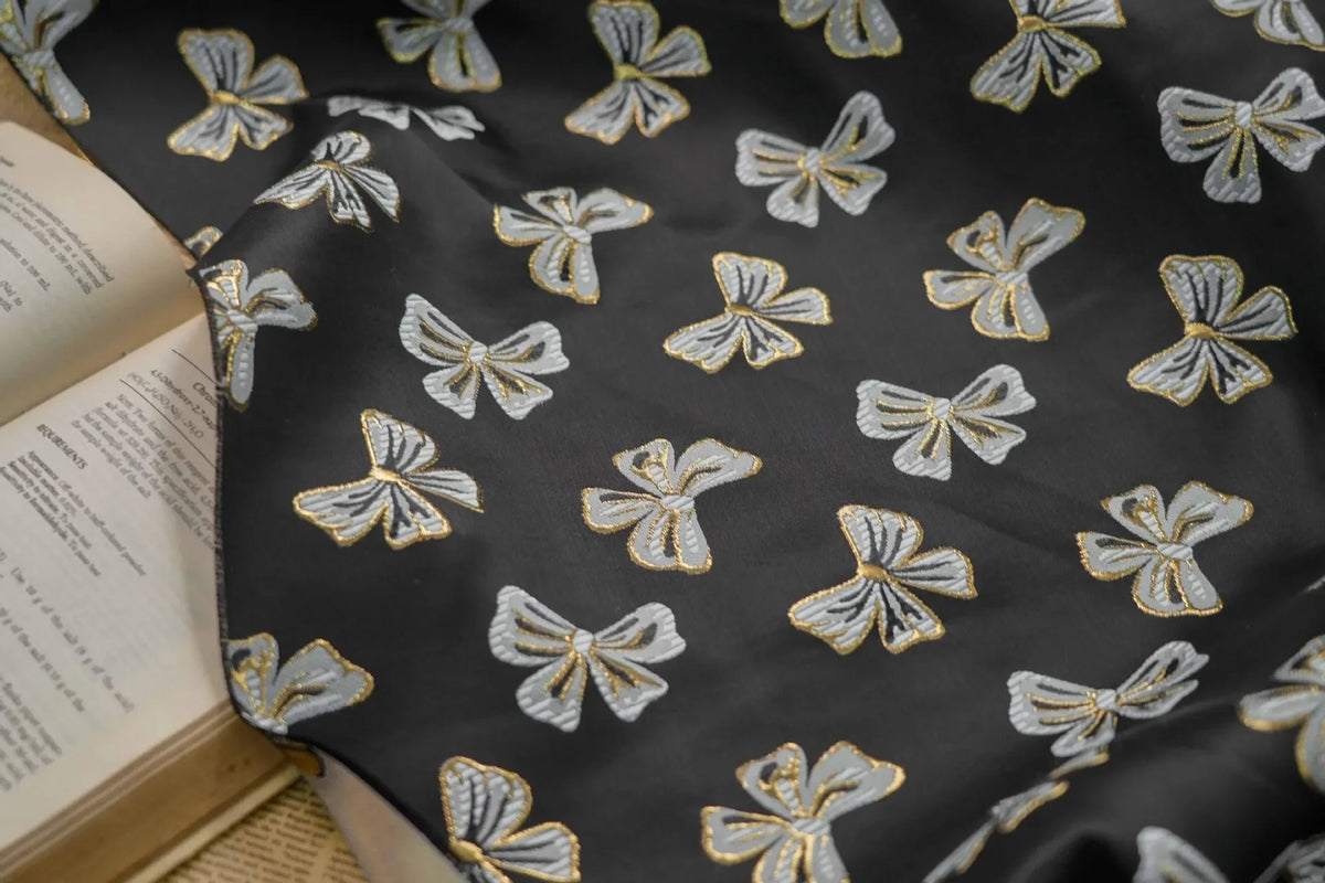 tissu polyester rose clair papillons doré noir moderne élégant coudre bricolage respectueux environnement Jacquard