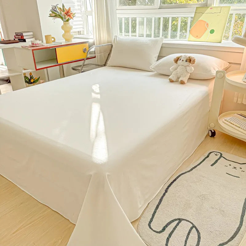 Ensemble 3 pièces de literie en coton percale uni dépliée