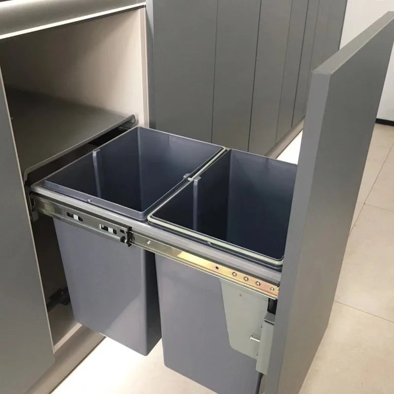 poubelles cuisine escamotables deux bacs gris moderne poignées couvercle amovible rails métalliques rangementintérieur
